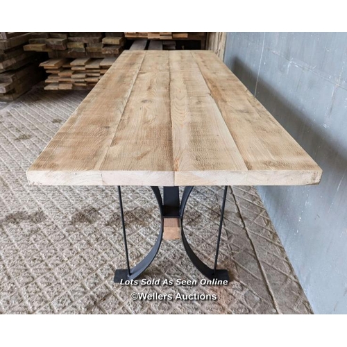 279 - Dining table with wrought iron base and reclaimed pine top and stretcher. 8 seater. 198cm L x 78cm W... 