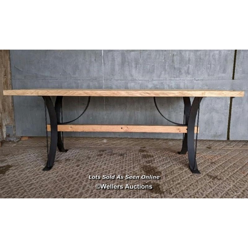 279 - Dining table with wrought iron base and reclaimed pine top and stretcher. 8 seater. 198cm L x 78cm W... 