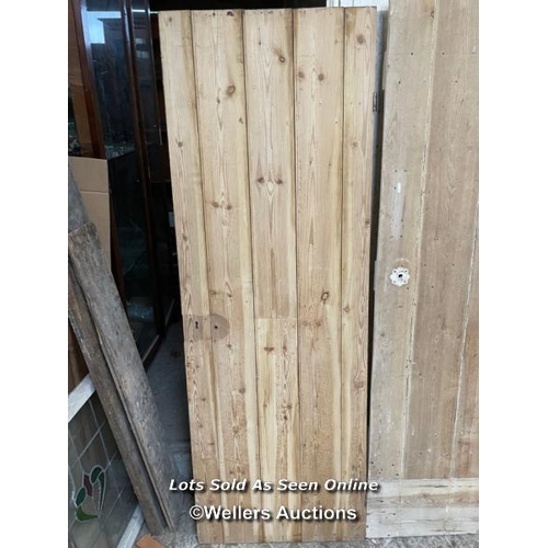 281 - 3 stripped pine plank cottage style doors. Sizes 60cm x 173cm. 79cm x 177cm. 79cm x 171cm