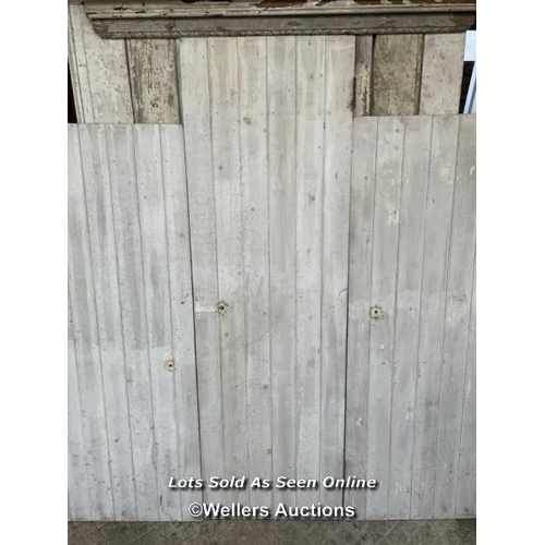 282 - 3 painted pine planked cupboard doors. Sizes 2 at 67.5cm x 167cm. 1 at 60cm x 196cm