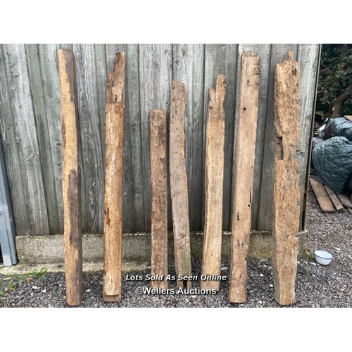 287 - 7 oak reclaimed oak beams. Some with joint cut outs, notches, chips, splits etc. average length 160c... 