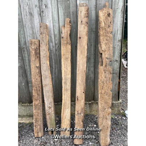 287 - 7 oak reclaimed oak beams. Some with joint cut outs, notches, chips, splits etc. average length 160c... 