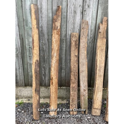 287 - 7 oak reclaimed oak beams. Some with joint cut outs, notches, chips, splits etc. average length 160c... 