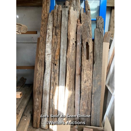 288 - 8 oak reclaimed oak beams. Some with joint cut outs, notches, chips, splits etc. average length 180c... 