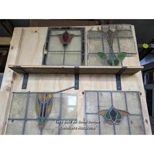 302 - 10 leaded stained glass panels in need of restoration. Some breaks in glass and lead missing.