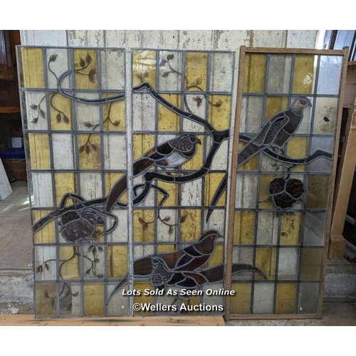 318 - Series of three stained glass panels with handpainted birds of the field. Small areas of damage. Siz... 