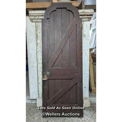 323 - An oak and pine Church door from a Church in Ventnor on the Isle of Wight. 81cm x 230cm x 5cm thick.... 