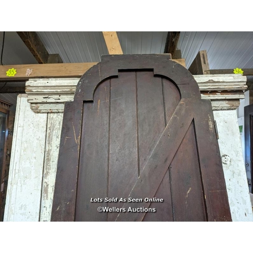 323 - An oak and pine Church door from a Church in Ventnor on the Isle of Wight. 81cm x 230cm x 5cm thick.... 