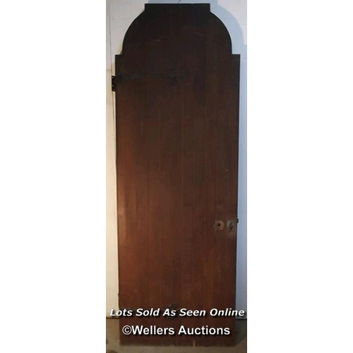 325 - An Edwardian oak Art Deco paneled door. C1930. Bullseye glass. 83.7cm x 204cm x 4.5cm. Morticed and ... 