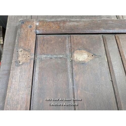 329 - A Victorian oak cottage door for restoration. Previous owner has added baton to deal with plank shri... 