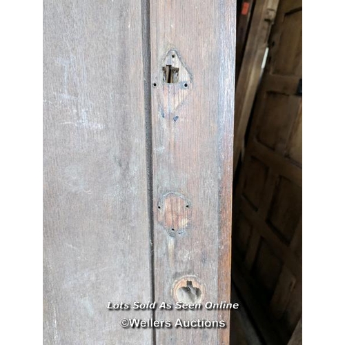 329 - A Victorian oak cottage door for restoration. Previous owner has added baton to deal with plank shri... 