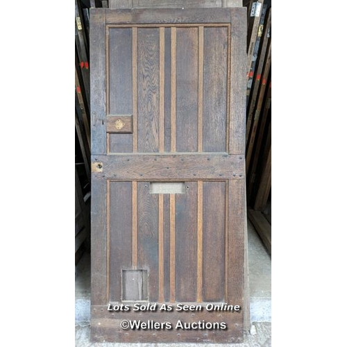 329 - A Victorian oak cottage door for restoration. Previous owner has added baton to deal with plank shri... 