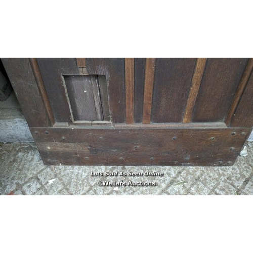 329 - A Victorian oak cottage door for restoration. Previous owner has added baton to deal with plank shri... 