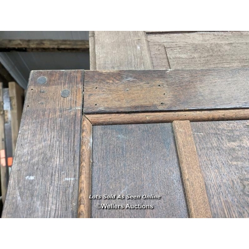 329 - A Victorian oak cottage door for restoration. Previous owner has added baton to deal with plank shri... 