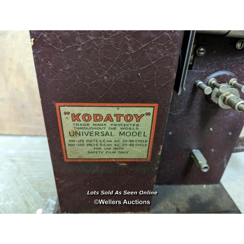 339 - A kodatoy film projector, good condition. Untested. Original box with Disney Mickey Mouse in very po... 