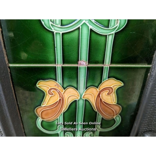 350 - A stovax cast iron fireplace insert with reproduction art nouveau tiles. Some small chips to tiles.