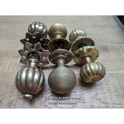 357 - 3 pairs of brass handles. One original victorian 'pumpkin' ,one beehive and one reproduction pair