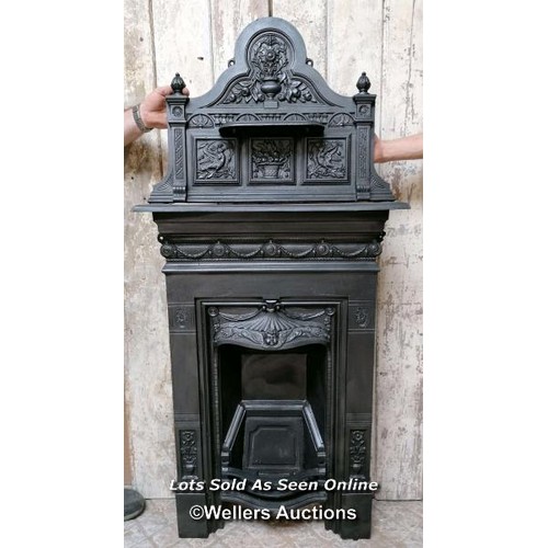 499 - Original Victorian Cast iron bedroom fireplace. Combination design with decorative top with angel or... 