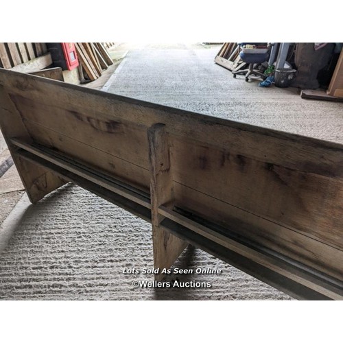 199 - A pair of solid oak pews. Grey colour and dirty due to being stored briefly outside. Height 84cm, le... 