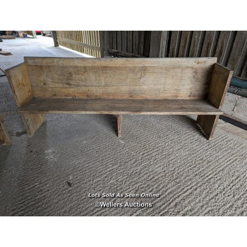 199 - A pair of solid oak pews. Grey colour and dirty due to being stored briefly outside. Height 84cm, le... 