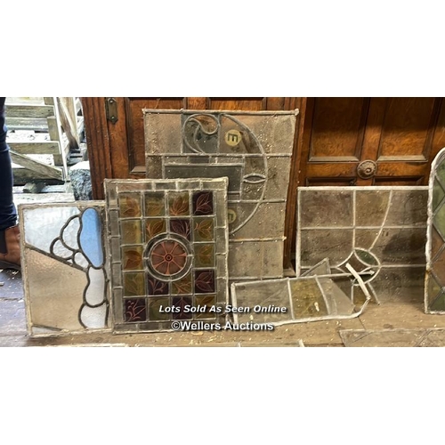 1013 - A GOOD SELECTION OF STAINED GLASS WINDOW PANES, VARIOUS SIZES AND DESIGNS, ALL FOR RESTORATION