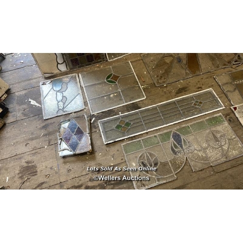 1013 - A GOOD SELECTION OF STAINED GLASS WINDOW PANES, VARIOUS SIZES AND DESIGNS, ALL FOR RESTORATION