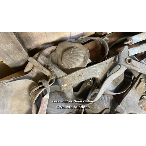 1023 - LARGE QUANTITY OF HORSE TACK, INCL. SADDLES, BLINKERS AND STIRRUPS