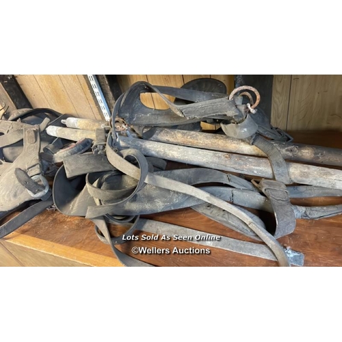 1023 - LARGE QUANTITY OF HORSE TACK, INCL. SADDLES, BLINKERS AND STIRRUPS