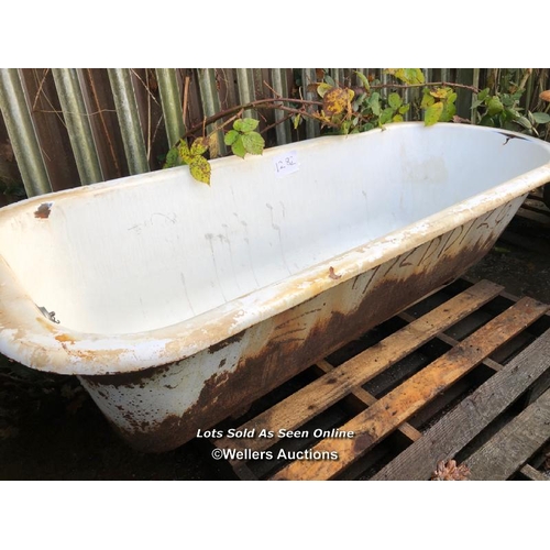 1282 - VINTAGE CAST IRON BATH TUB, WITH TWO FEET, 180CM (L) X 89CM (W) X 42CM (H)