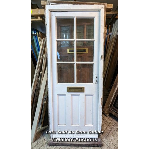 311 - Modern front door and pine frame, no lock or handle. Frame 85cmw x 208cm h x 8cm d