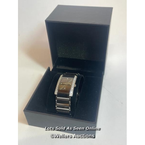 311 - Tungsten wristwatch, quartz movement, tank style case with cubic zirconia borders on mirror bracelet... 