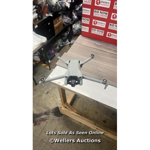 8052 - DJI MINI 3 WITH DJI REMOTE CONTROL / POWERS UP, SIGNS OF USE, FLIES SUCCESSFULLY, ONE DAMAGED PROP(E... 