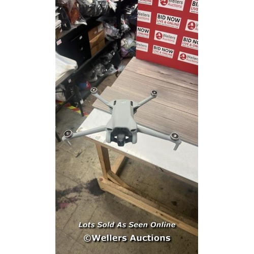 8052 - DJI MINI 3 WITH DJI REMOTE CONTROL / POWERS UP, SIGNS OF USE, FLIES SUCCESSFULLY, ONE DAMAGED PROP(E... 