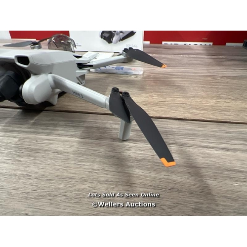 8052 - DJI MINI 3 WITH DJI REMOTE CONTROL / POWERS UP, SIGNS OF USE, FLIES SUCCESSFULLY, ONE DAMAGED PROP(E... 