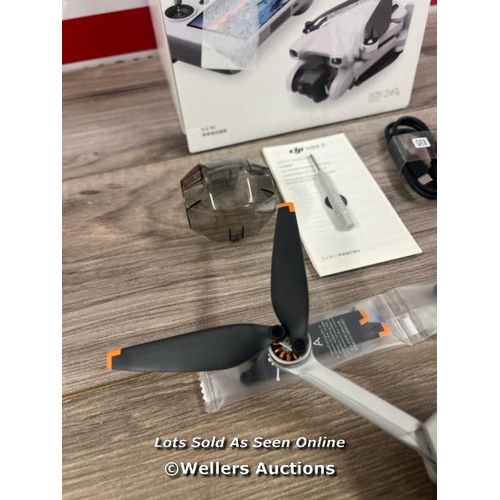 8052 - DJI MINI 3 WITH DJI REMOTE CONTROL / POWERS UP, SIGNS OF USE, FLIES SUCCESSFULLY, ONE DAMAGED PROP(E... 