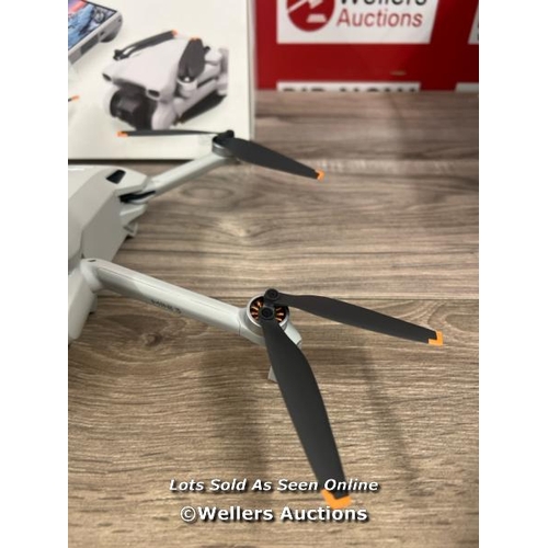 8053 - DJI MINI 3 WITH DJI REMOTE CONTROL / POWERS UP, SIGNS OF USE, DAMAGED GIMBAL(SEE IMAGES), FLIES SUCC... 