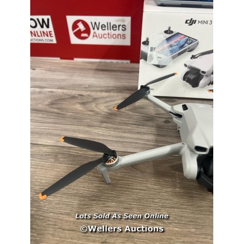 8053 - DJI MINI 3 WITH DJI REMOTE CONTROL / POWERS UP, SIGNS OF USE, DAMAGED GIMBAL(SEE IMAGES), FLIES SUCC... 