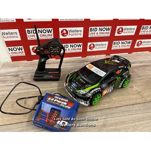 8136 - KEN BLOCK FIESTA TRAXXAS 1/16 RC CAR / POWERS UP AND APPEARS FUNCTIONAL (VERY FAST, GOOD FUN!!!!)