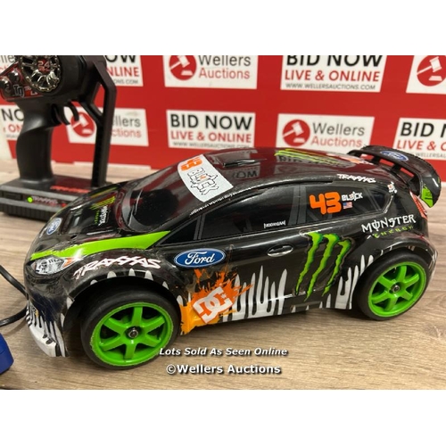 8136 - KEN BLOCK FIESTA TRAXXAS 1/16 RC CAR / POWERS UP AND APPEARS FUNCTIONAL (VERY FAST, GOOD FUN!!!!)