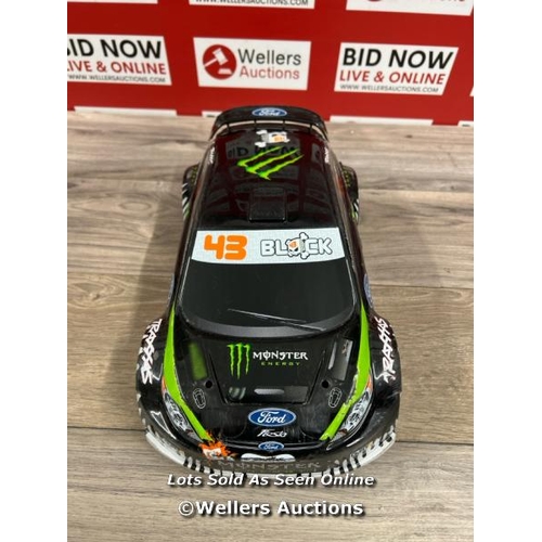 8136 - KEN BLOCK FIESTA TRAXXAS 1/16 RC CAR / POWERS UP AND APPEARS FUNCTIONAL (VERY FAST, GOOD FUN!!!!)