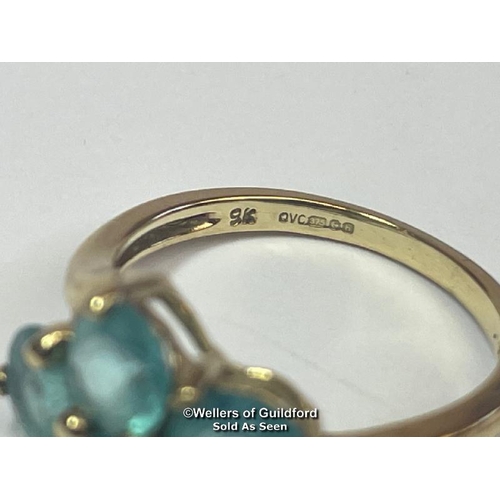 382 - Blue topaz (untested) qautrefoil ring in hallmarked 9ct gold by QVC, ring size J, weight 2.51g