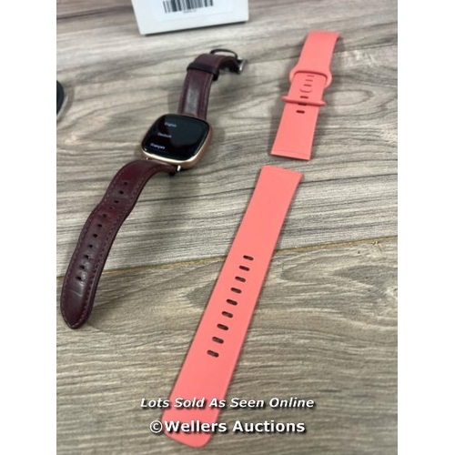 8041 - FITBIT VERSA 4 / PINK / POWERS UP / MINIMAL SIGNS OF USE / APPEARS FACTORY RESET / VERY MINOR SCRATC... 