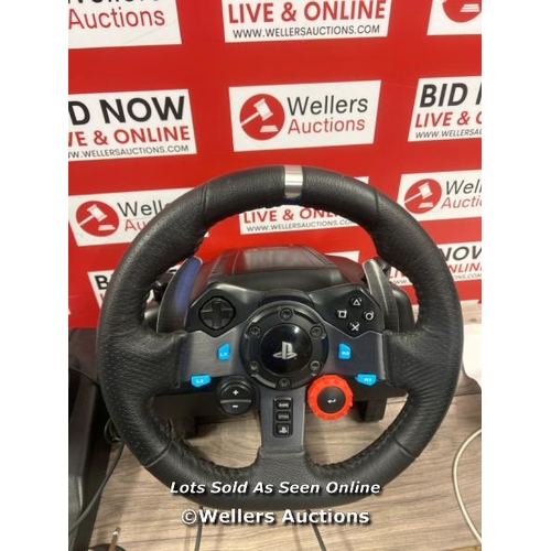 8115 - LOGITECH G290 DRIVING FORCE GAMING STEERING WHEEL & PEDAL . COMPATIBLE WITH PS4 & PS5 / SIGNS OF USE... 