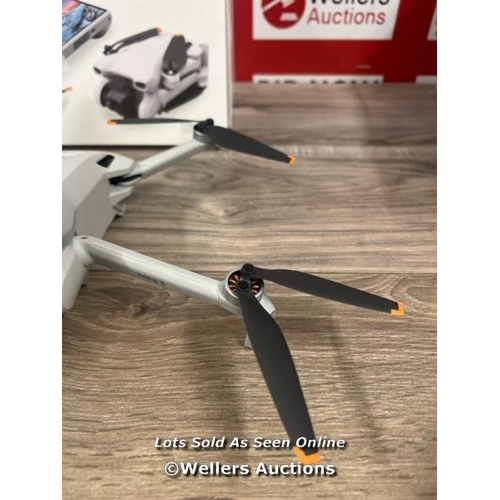 8108 - DJI MINI 3 WITH DJI REMOTE CONTROL / POWERS UP, SIGNS OF USE, DAMAGED GIMBAL(SEE IMAGES), FLIES SUCC... 