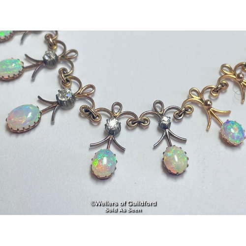 349 - Early 20th Century opal and diamond fringe necklace with fifteen oval opals measuring approx. 8x6mm ... 