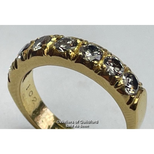 353 - Diamond eternity half band ring in 18ct gold. Seven round cut brilliant diamonds estimated total wei... 