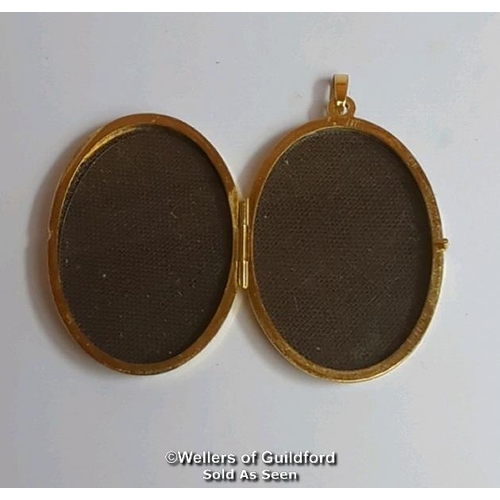 375 - Two locket pendants: one 9ct gold oval locket with engraved front, hallmarked on bail, dimensions 4c... 