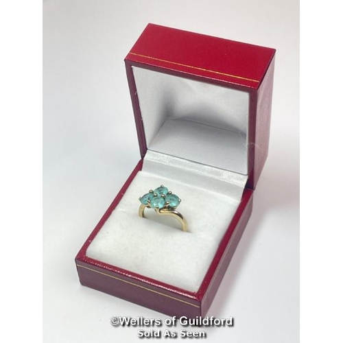 382 - Blue topaz (untested) qautrefoil ring in hallmarked 9ct gold by QVC, ring size J, weight 2.51g