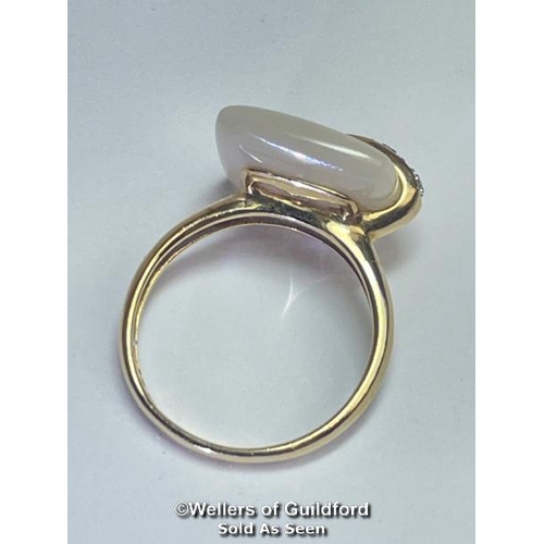 388 - Mother of pearl and diamond ring in hallmarked 9ct gold by QVC. Ring size P, dimensions of stone 15m... 