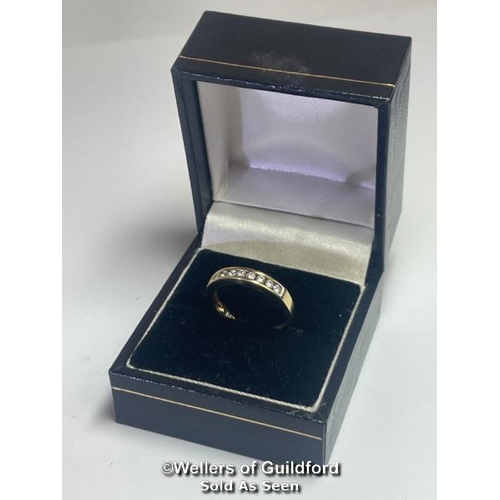 390 - Diamond channel set eternity half band ring in hallmarked 18ct gold. Estimated diamond weight 0.25ct... 